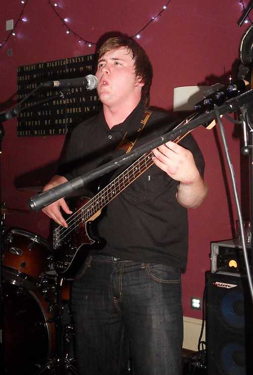 George Eddy George Eddy bass guitarist for Six Is Out